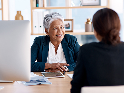 Meeting, talking or senior manager in job interview with business women in b2b negotiation discussion. Partnership collaboration, recruitment or lady speaking to hr management for hiring opportunity.