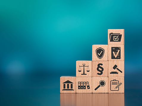 Concept of compliance with icons on wooden cubes