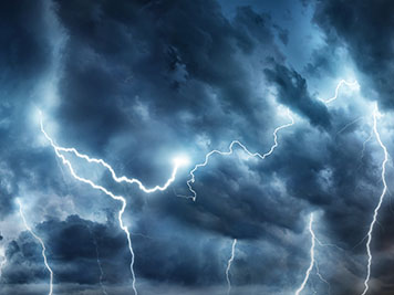 Lightning thunderstorm flash over the night sky. Concept on topic weather, cataclysms (hurricane, Typhoon, tornado, storm) 