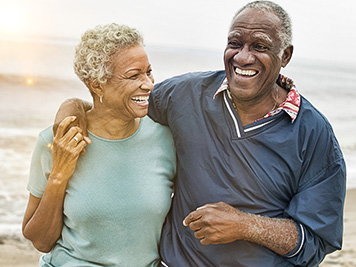 Happy Senior African American Couple on the Beach