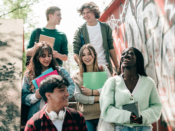 group of young people in a student exchange program meet together after language lessons