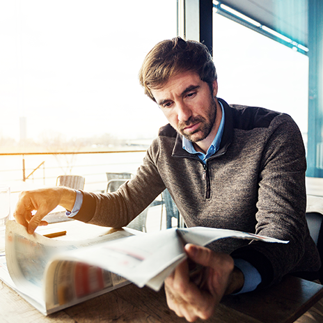 Business man reviewing employee stock purchase plan options.