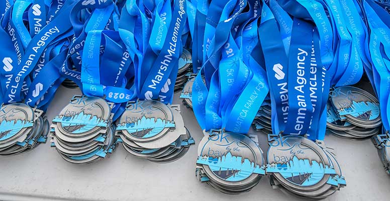 Shining 5K by the Bay medals await race participants
